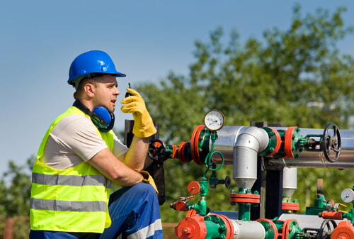 oil field worker wearing his safety equipment on the job